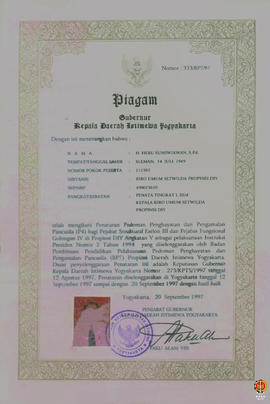 Piagam dari Gubernur Kepala DIY diberikan kepada H.Heru Sumiwiawan , S,P,D dkk perihal telah meng...